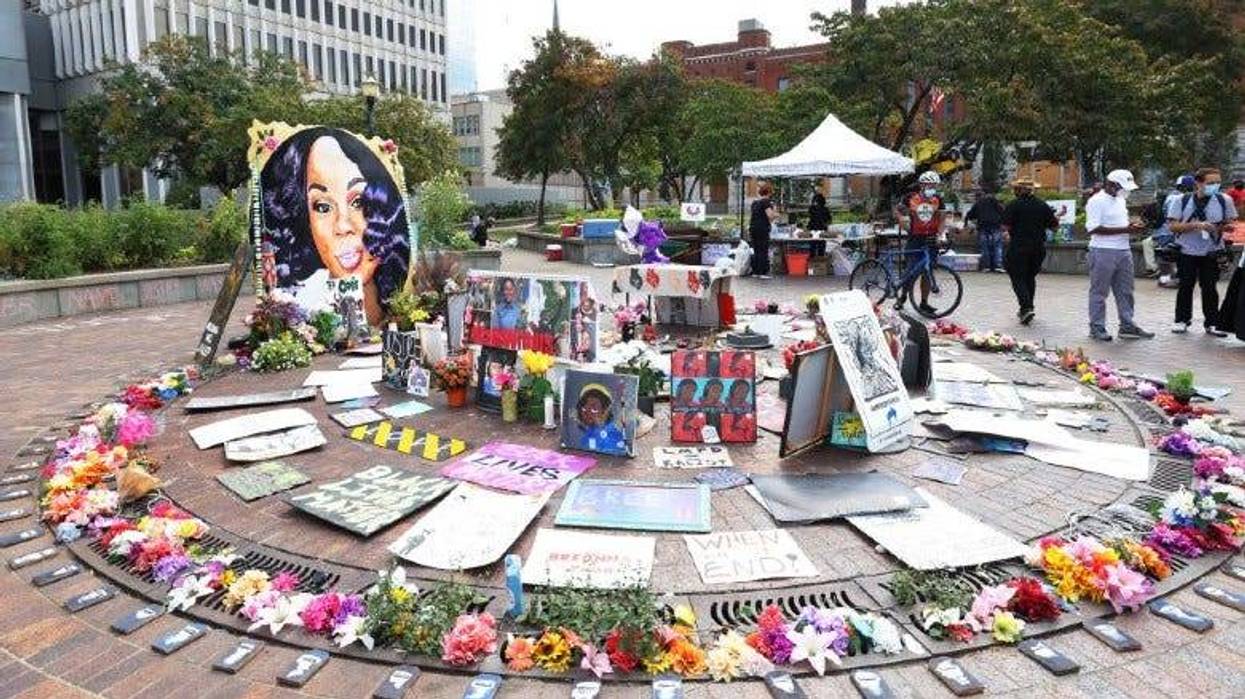 People visit a makeshift memorial for Breonna Taylor on September 24, 2020 in Louisville, Kentucky.