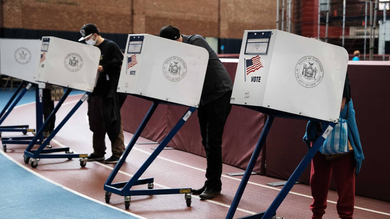People visit an early voting site at a YMCA in Brooklyn on October 25, 2021