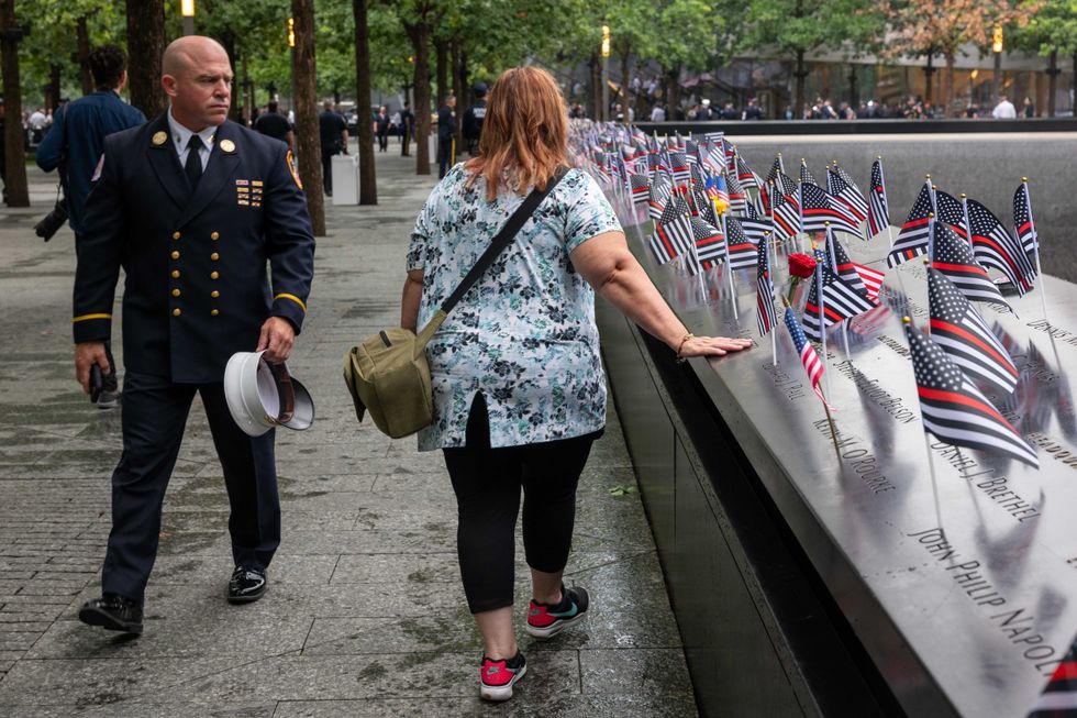 People visit the 9/11 Memorial on the 22nd anniversary of the attacks on September 11, 2023