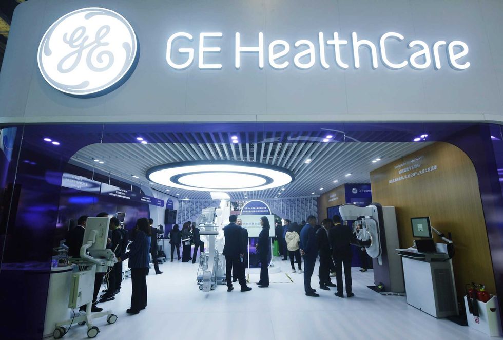 People visit the booth for GE Healthcare -- which made its Fortune 500 debut this year -- during the 6th China International Import Expo (CIIE) at the National Exhibition and Convention Center (Shanghai) on November 6, 2023 in Shanghai, China.