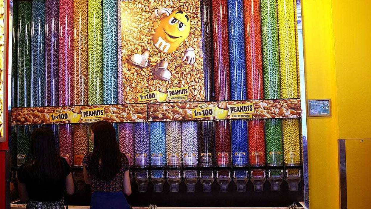 People visit the M&M store in Times Square on July 24, 2014 in New York City.