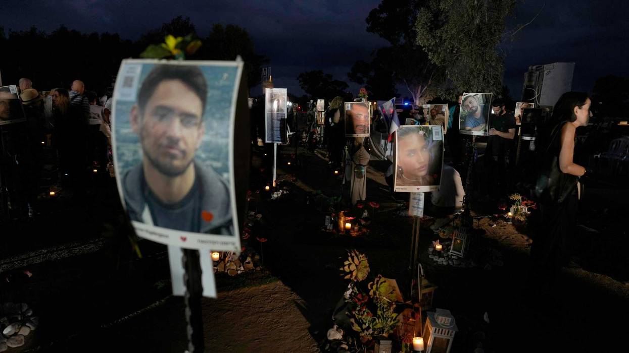 People visit the site of the Nova music festival, where hundreds of revelers were killed and abducted by Hamas and taken into Gaza, on the one-year anniversary of the attack, near Kibbutz Reim, southern Israel, Monday, Oct. 7, 2024.