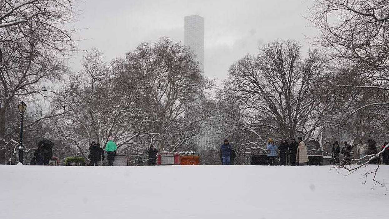 People visit the snow-covered Central Park in New York, the United States, on Dec. 27, 2025.