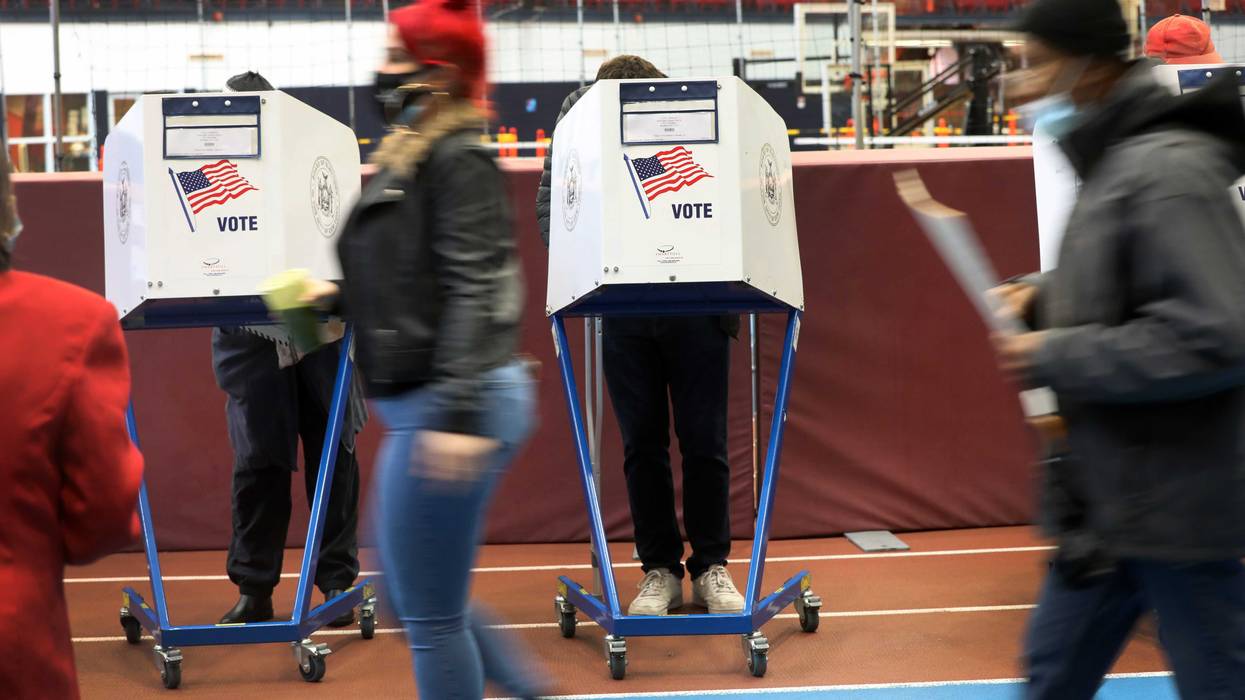 People vote at the Brooklyn Armory during early voting on October 28, 2020 in New York City.
