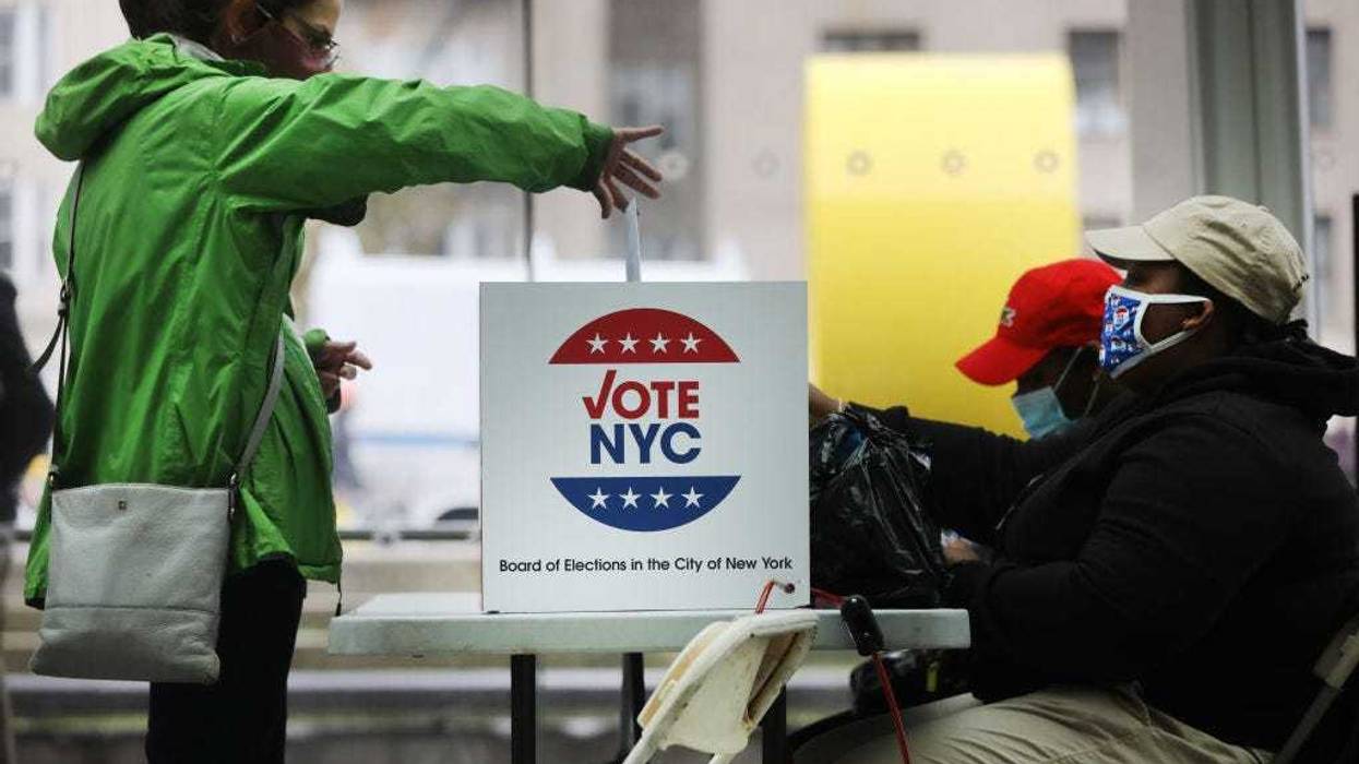 People vote at the Brooklyn Museum during early voting on October 28, 2020 in New York City. Election officials are trying to ensure that the voting process is both safe and efficient due to the coronavirus (COVID-19) pandemic.