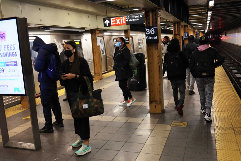 People wait for the train at the 36th Street subway station on April 13, 2022 in Sunset Park, Brooklyn