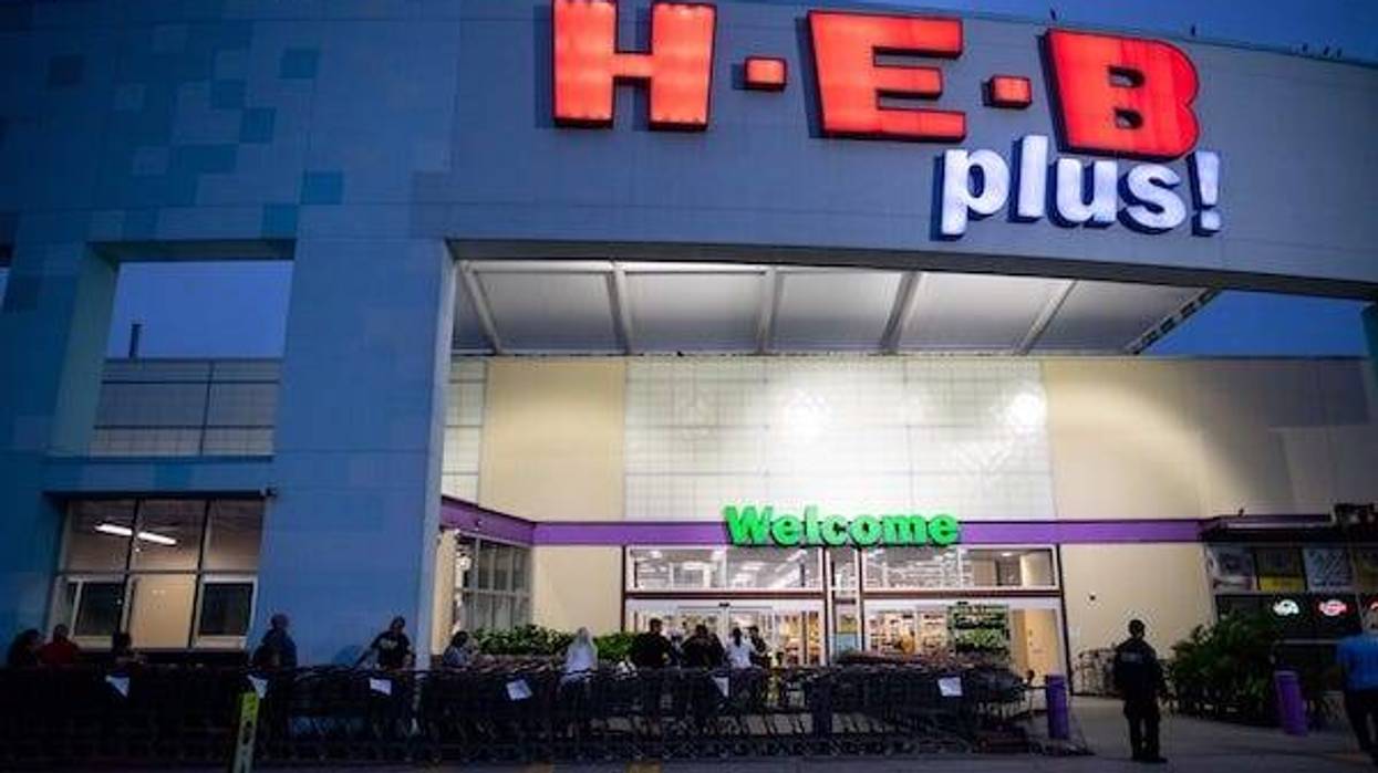 People wait in line at the HEB on Saratoga Boulevard for the store to open at 8am on Sunday, March 15, 2020