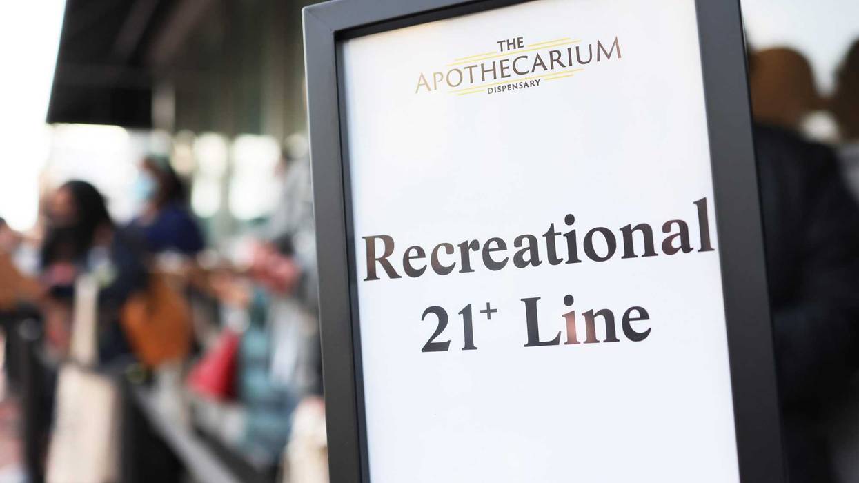People wait in line to enter Apothecarium Dispensary on April 21, 2022 in Maplewood, New Jersey. Today marked the first day of legal recreational marijuana sales in the state of New Jersey.