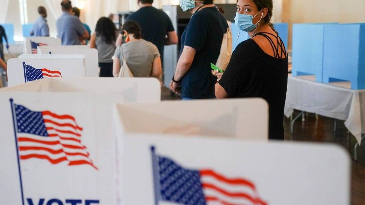 People wait in line to vote in Georgia's Primary Election on June 9, 2020 in Atlanta, Georgia.