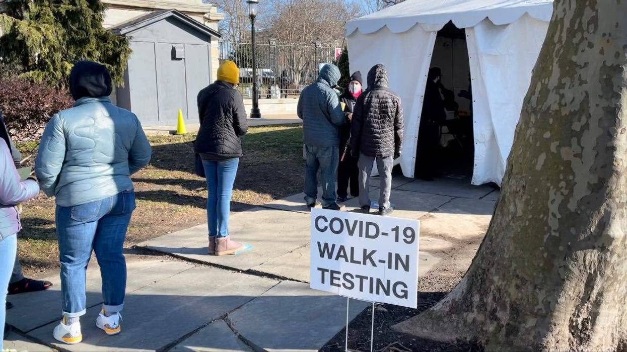 People waiting in line to get a COVID-19 test.