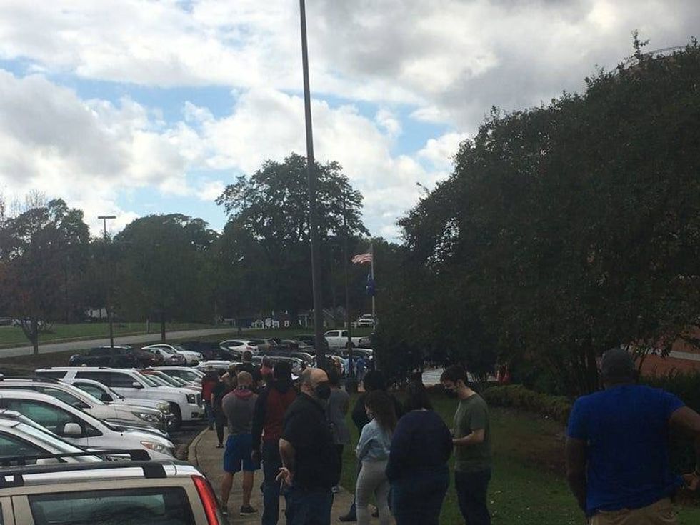 People waiting in line to vote early at the Simpsonville Activity and Senior Center on October 29