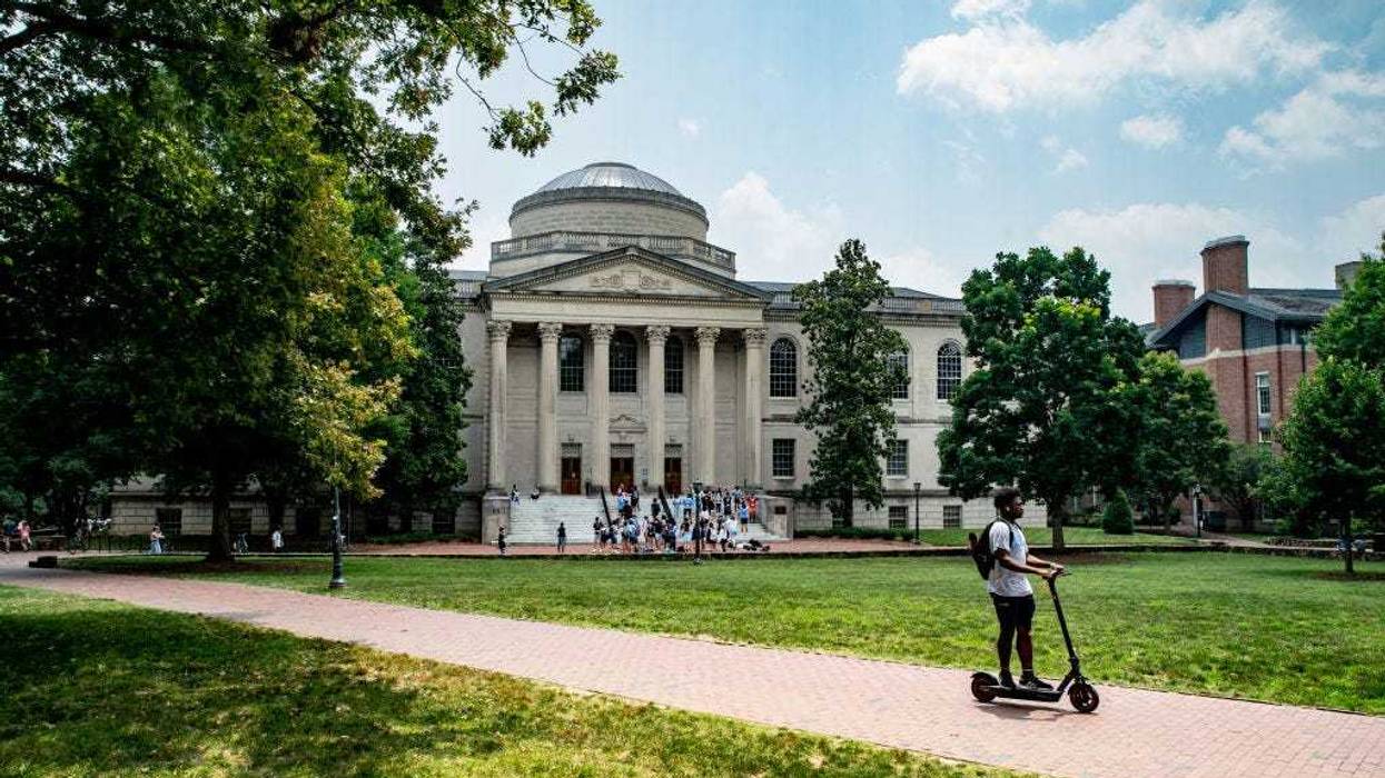 People walk on the campus of the University of North Carolina Chapel Hill on June 29, 2023 in Chapel Hill, North Carolina.