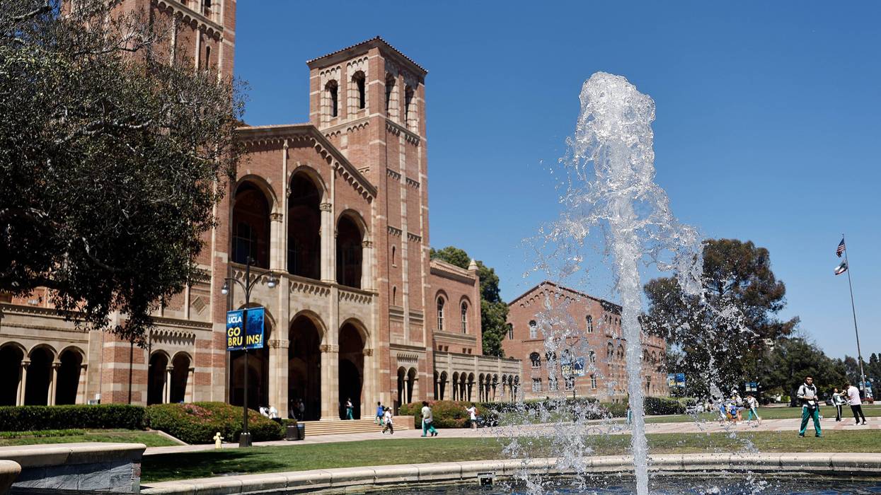 People walk on the plaza outside Royce Hall, the site of 2024 pro-Palestinian protests, on the UCLA campus on July 30, 2025 in Los Angeles, California.