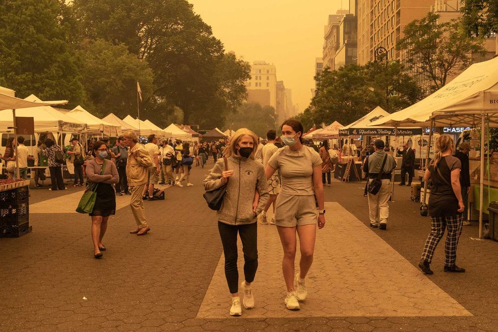 People wear masks in Union Square on June 7, 2023, because of bad air quality brought in by smoke of Canadian wildfires