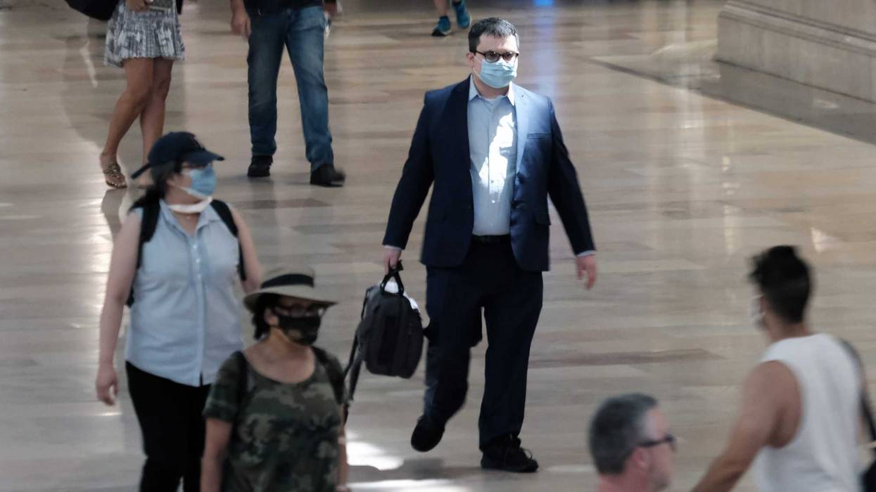 People wear masks while walking in Grand Central Terminal on July 27, 2021 in New York City
