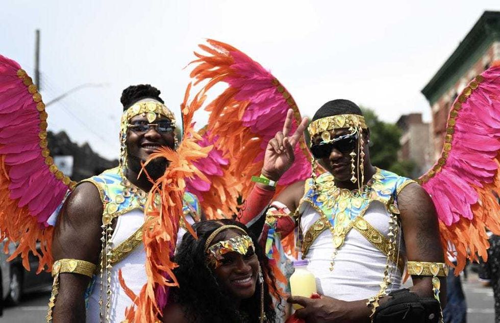 People wearing costumes take part in the Labor Day Parade, also known as West Indian Carnival, an annual celebration held on American Labor Day (the first Monday in September) in Crown Heights, Brooklyn, New York, United States on September 4, 2023. The carnival attracts thousands of participants with colorful costumes accompanied with native music.
