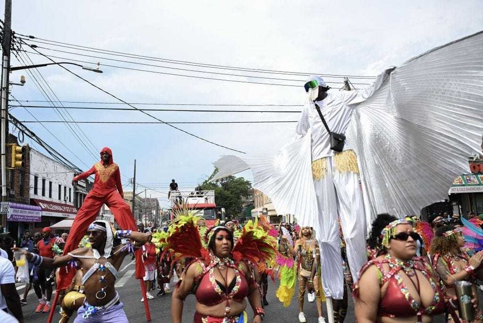 People wearing costumes take part in the Labor Day Parade, also known as West Indian Carnival, an annual celebration held on American Labor Day (the first Monday in September) in Crown Heights, Brooklyn, New York, United States on September 4, 2023. The carnival attracts thousands of participants with colorful costumes accompanied with native music.