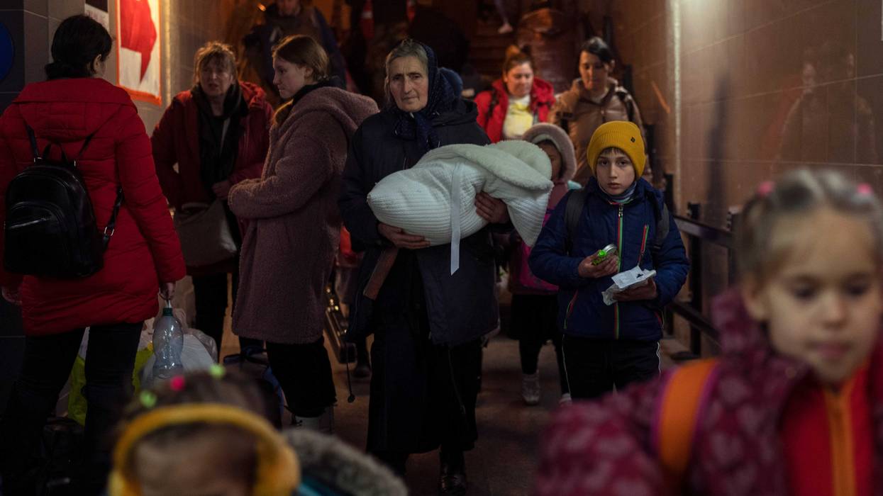 People who fled the war in Ukraine leave Przemysl train station in Przemysl, Poland, Tuesday, March 15, 2022.