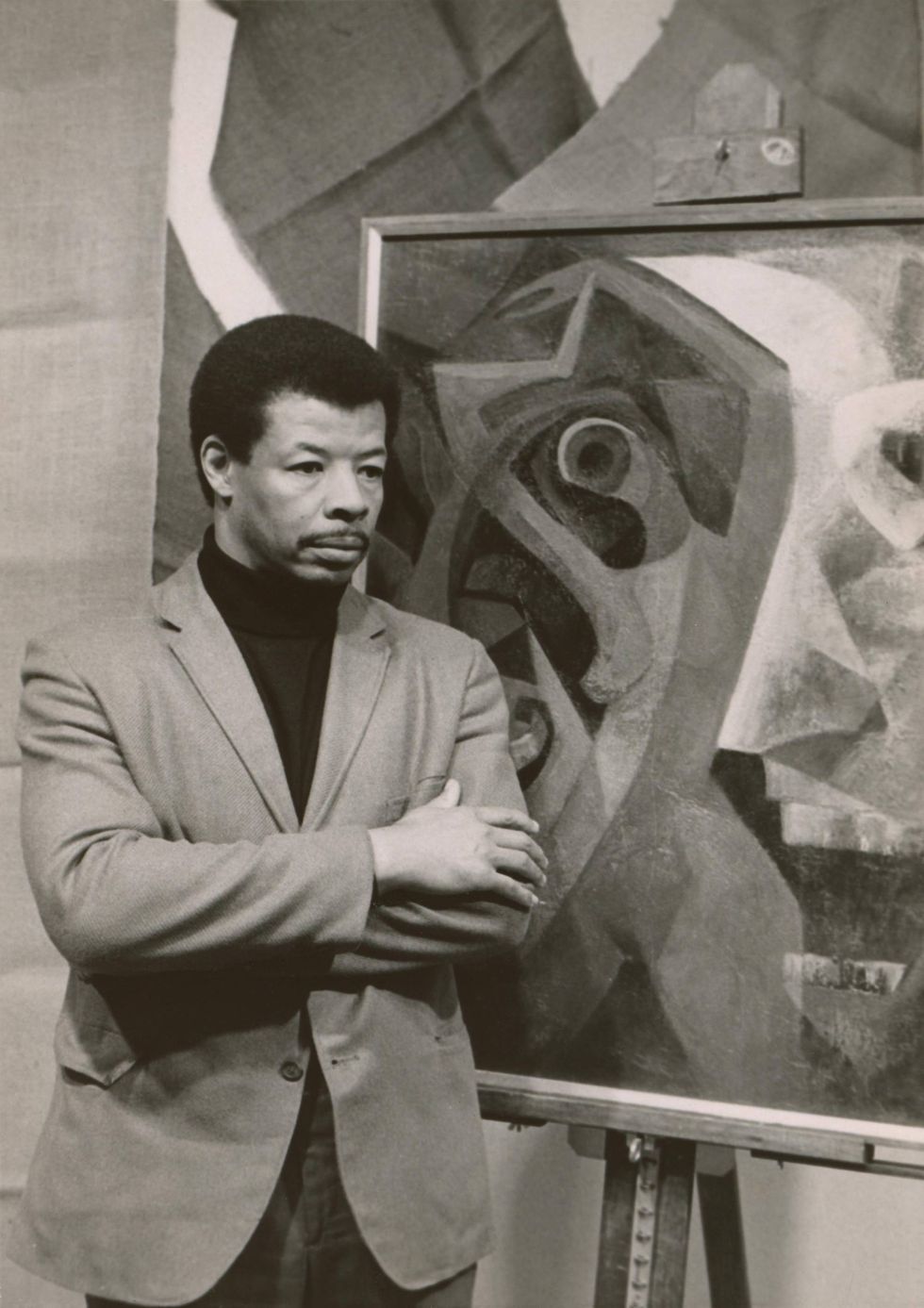 Percy Ricks with painting, c. 1970.