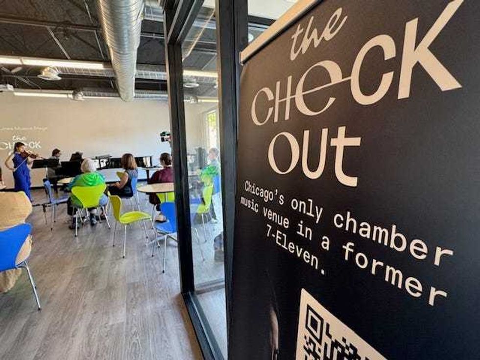 Performers inside The Checkout