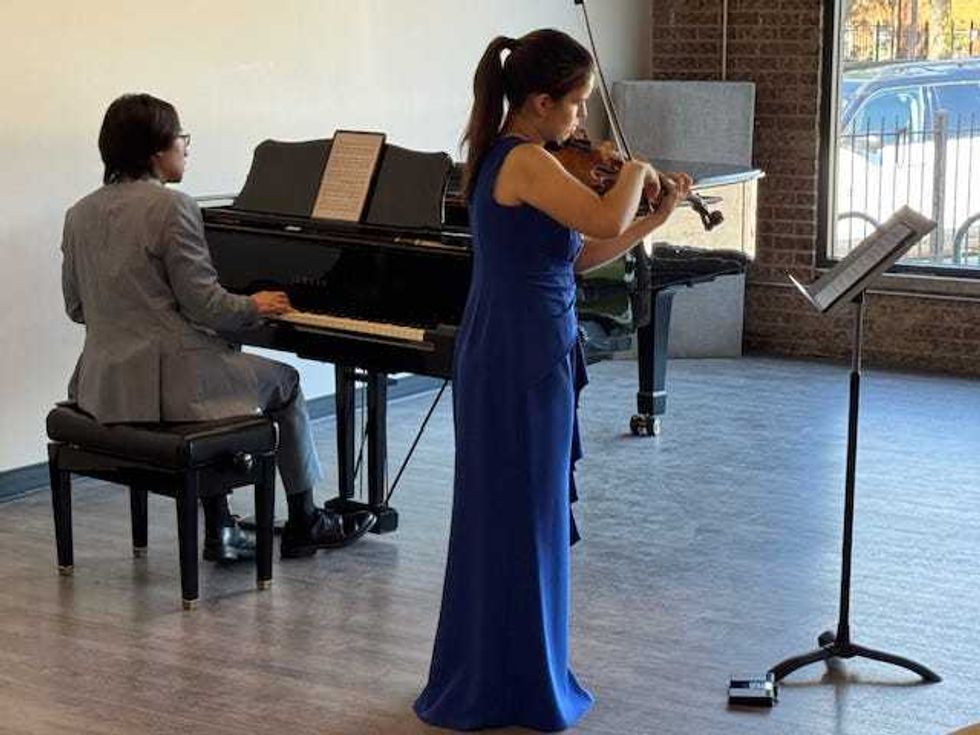 Performers inside The Checkout