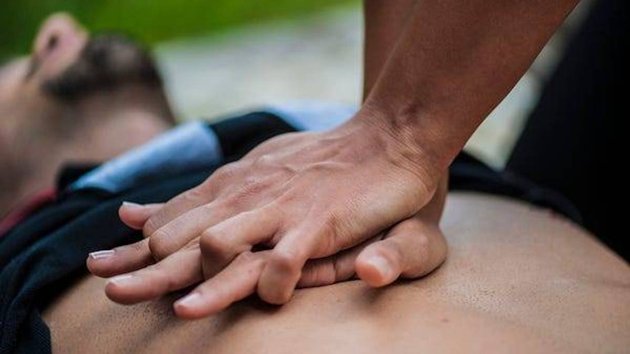 Performing CPR on a man