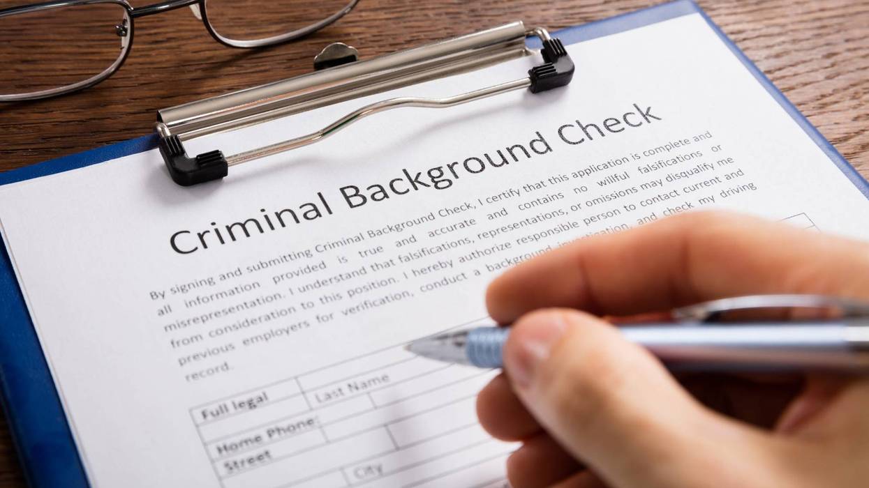 Person filling out criminal background check