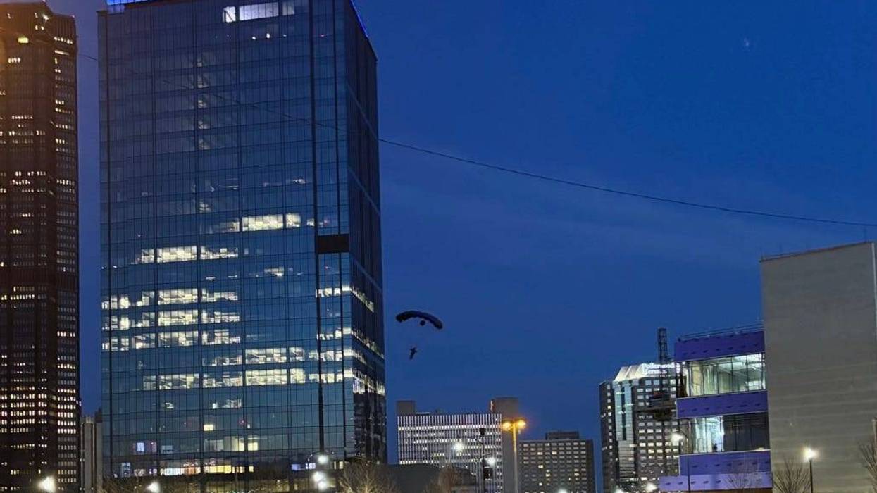 Person jumping off FNB building