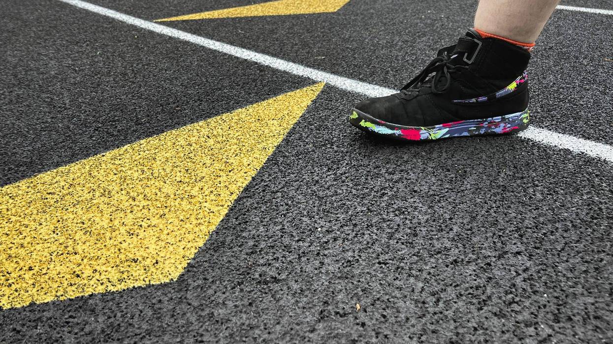 Person on a high school track