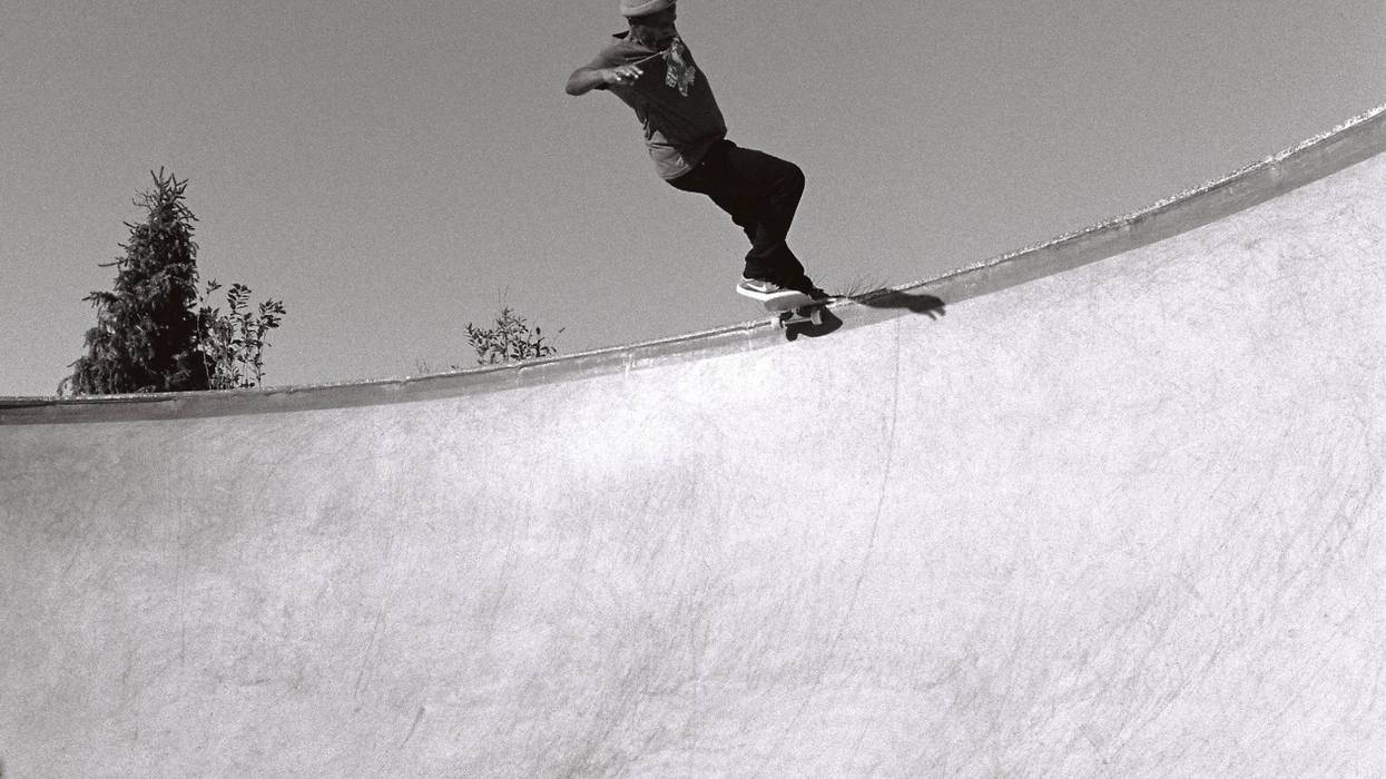 person on skateboard ramp