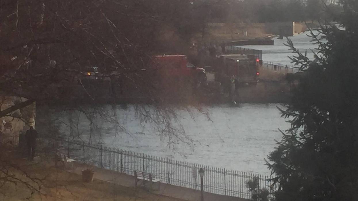 person pulled from detroit river