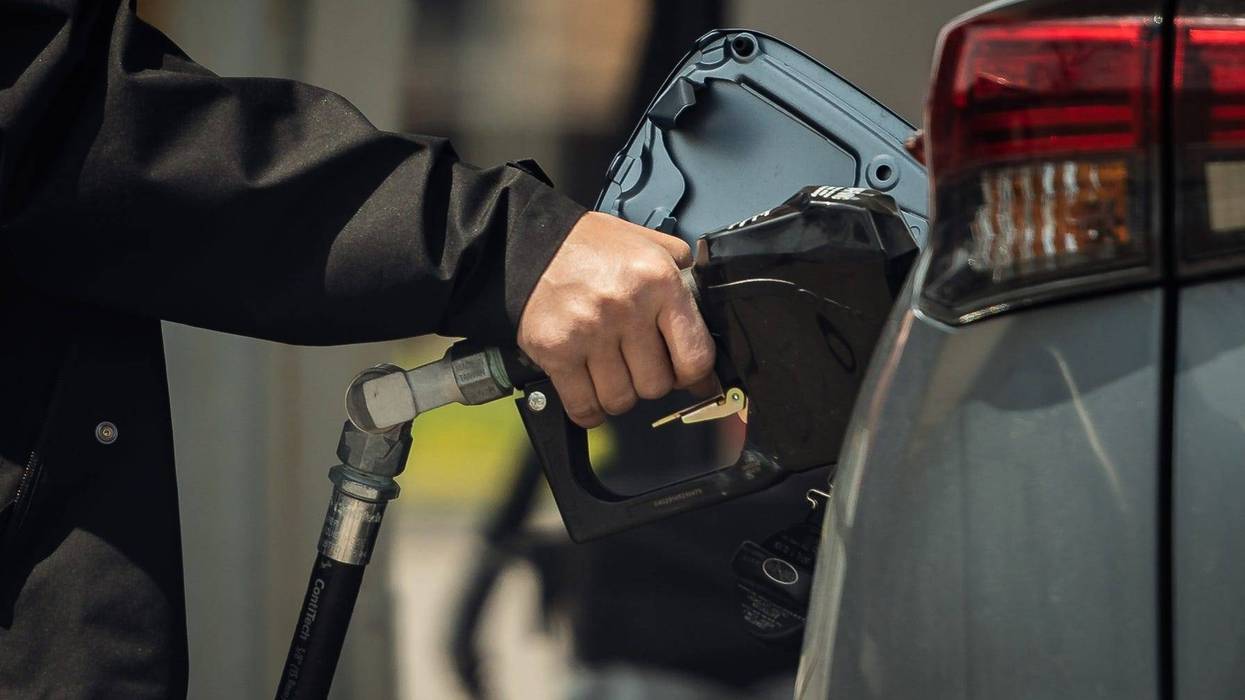 Person pumping gas