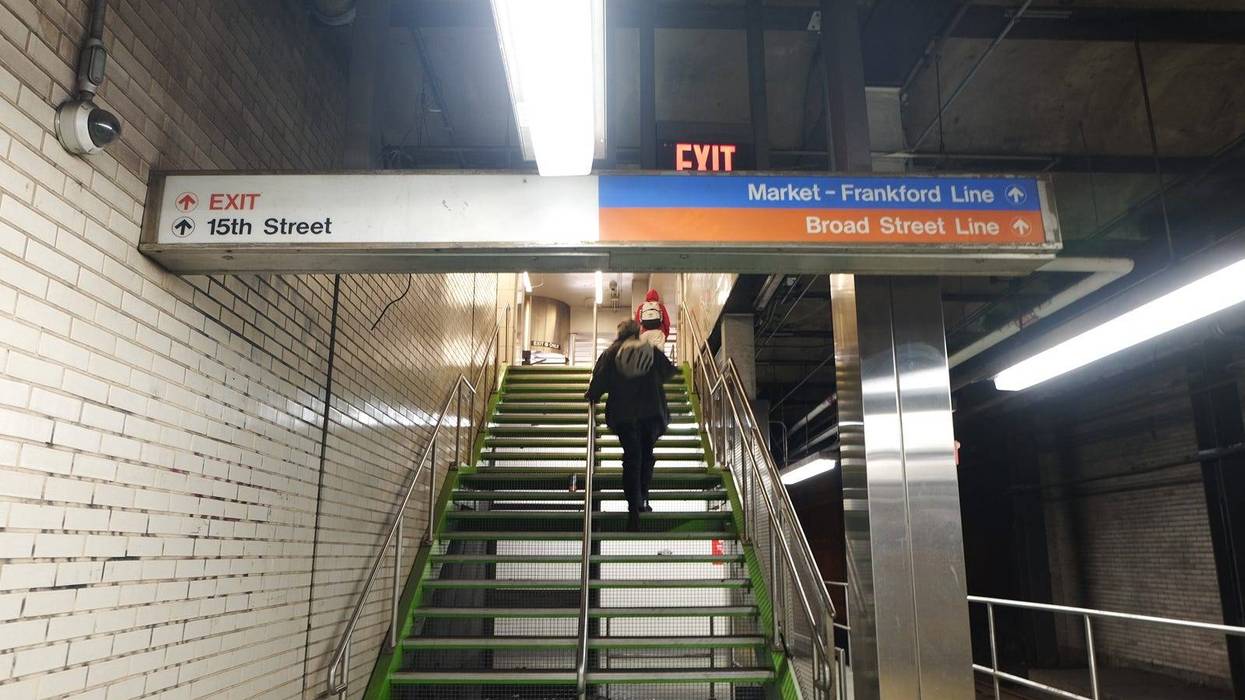 Person walking up SEPTA steps