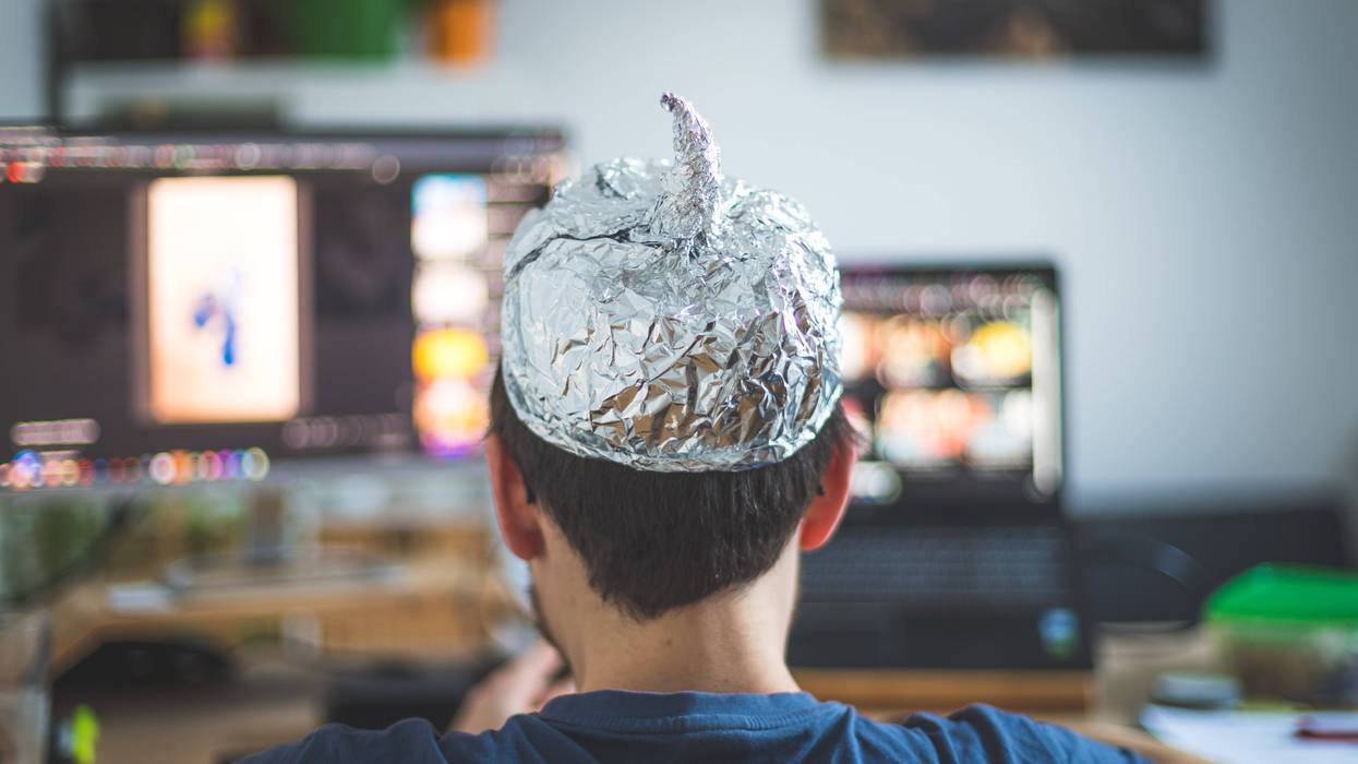 person wearing a tin foil hat