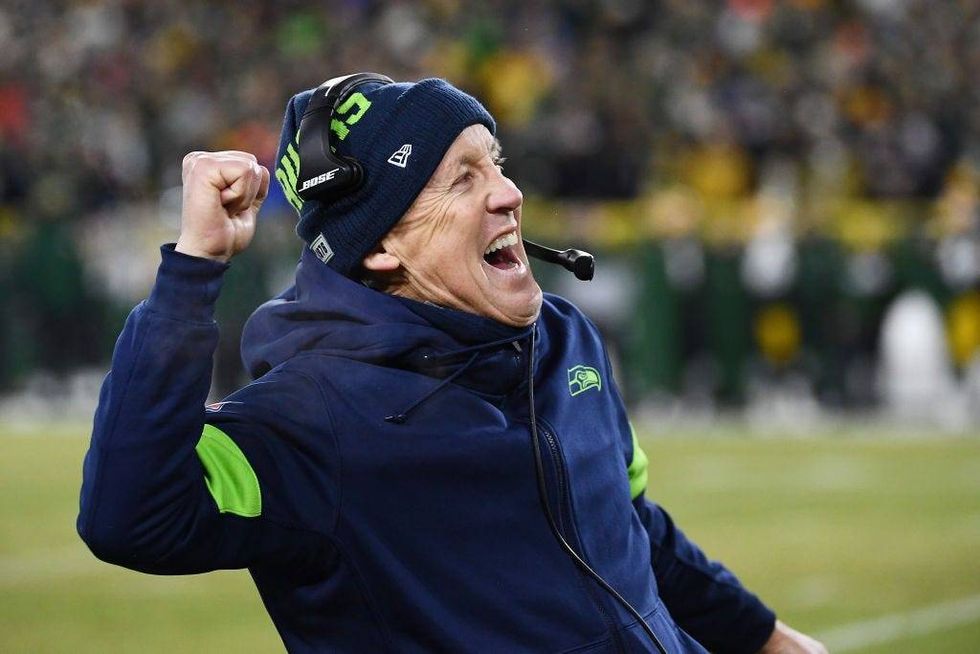 Pete Carroll celebrates a Seahawks TD against the Packers.