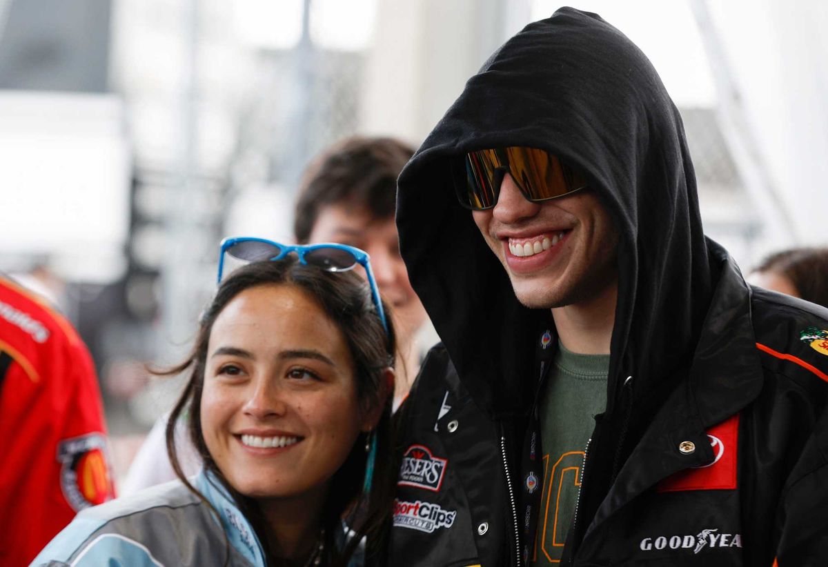 Pete Davidson and girlfriend Chase Sui attend a tour prior to the NASCAR Cup Series 65th Annual Daytona 500 at Daytona International Speedway on February 19, 2023 in Daytona Beach, Florida.
