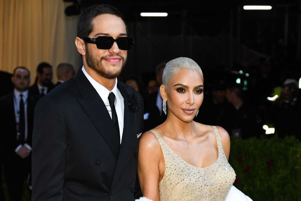 Pete Davidson with Kim Kardashian as she wears Marilyn Monroe