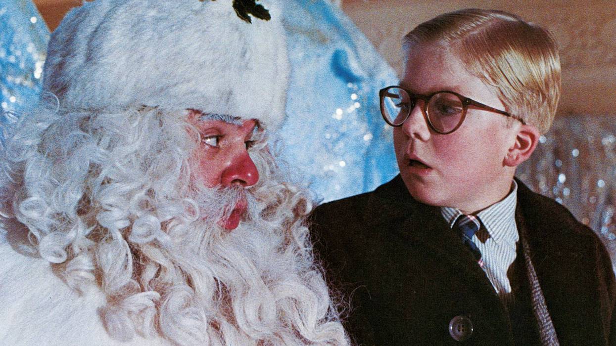Peter Billingsley sits on Santa's lap in a scene from the film 'A Christmas Story', 1983.