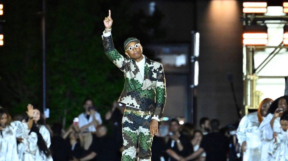 Pharrell performed with JAY-Z, debuted new music from Clipse at his first Louis Vuitton show