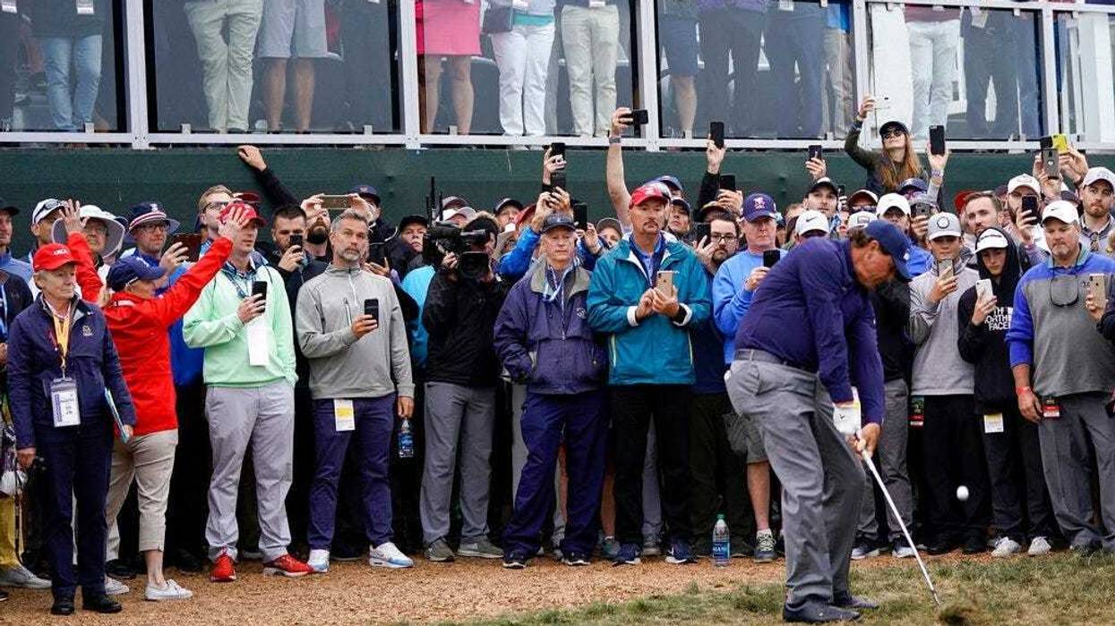Phil Mickelson hits from the rough on the 18th hole during the second round of the U.S. Open golf tournament Friday, June 14, 2019, in Pebble Beach, Calif.