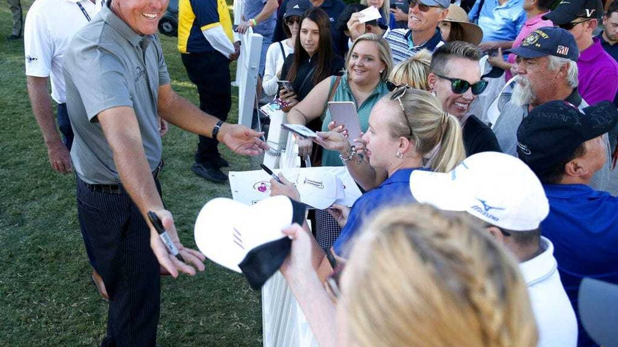 Phil Mickelson signs autographs after finishing the 18th hole during the second round of Shriners Hospitals for Children Open golf tournament at TPC Summerlin in Las Vegas on Friday, Oct. 4, 2019. (