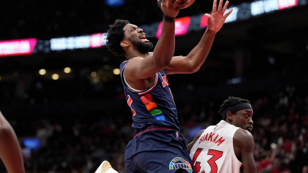 Philadelphia 76ers center Joel Embiid (21) collides with Toronto Raptors forward Pascal Siakam (43) during the second half of Game 6 of an NBA basketball first-round playoff series in Toronto, April 28, 2022.