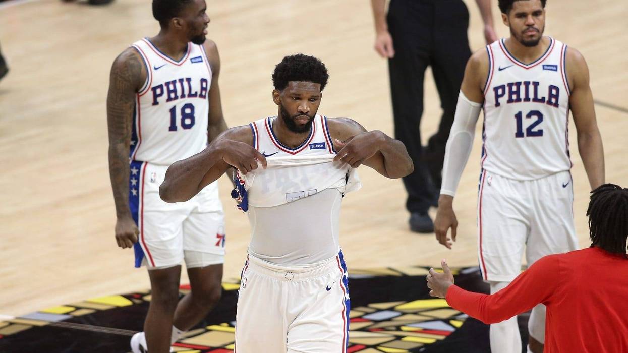 Philadelphia 76ers center Joel Embiid (21), guard Shake Milton (18) and forward Tobias Harris (12)