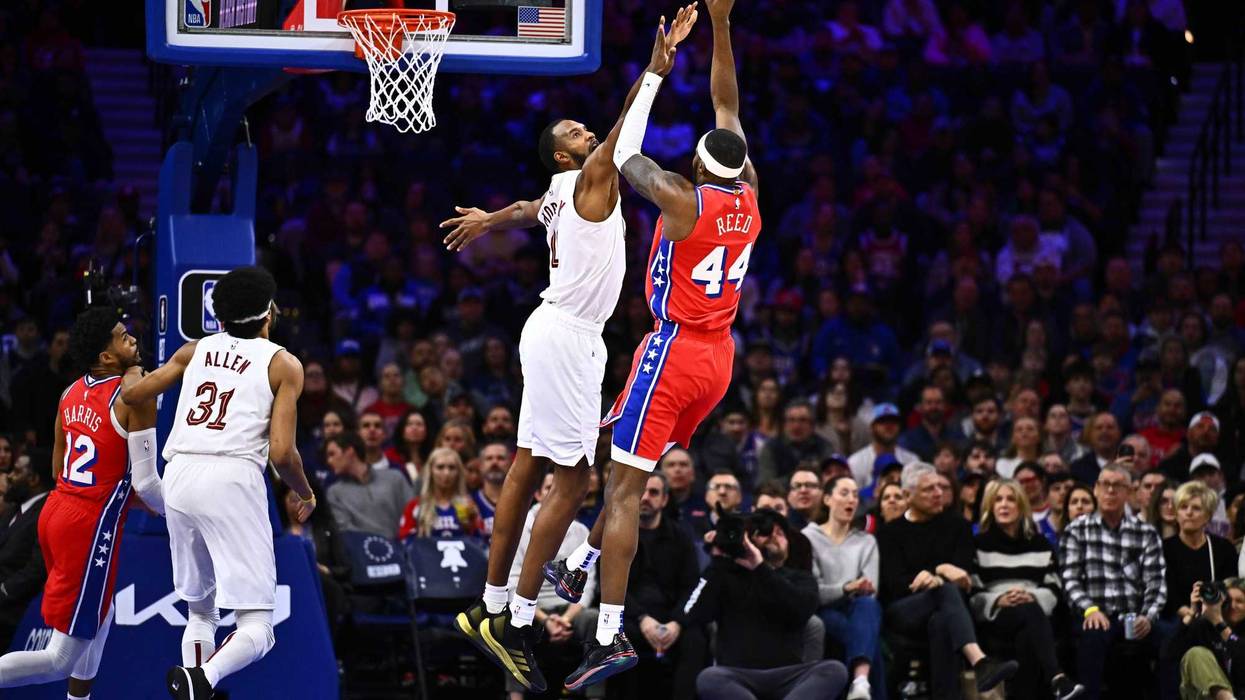 Philadelphia 76ers forward Paul Reed (44) shoots against Cleveland Cavaliers center Evan Mobley (4) in the first quarter at Wells Fargo Center.