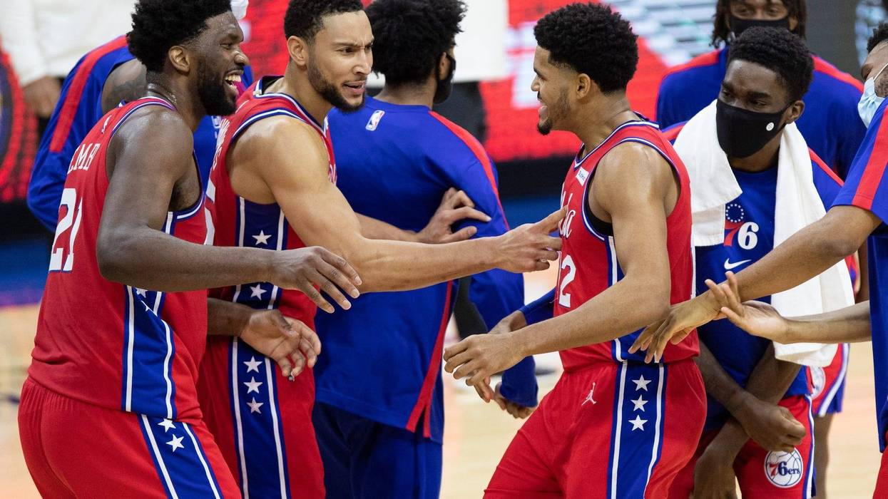 Philadelphia 76ers forward Tobias Harris (12) celebrates with guard Ben Simmons (25) and center Joel Embiid (21) after scoring the game winning basket during the fourth quarter against the Los Angeles Lakers.