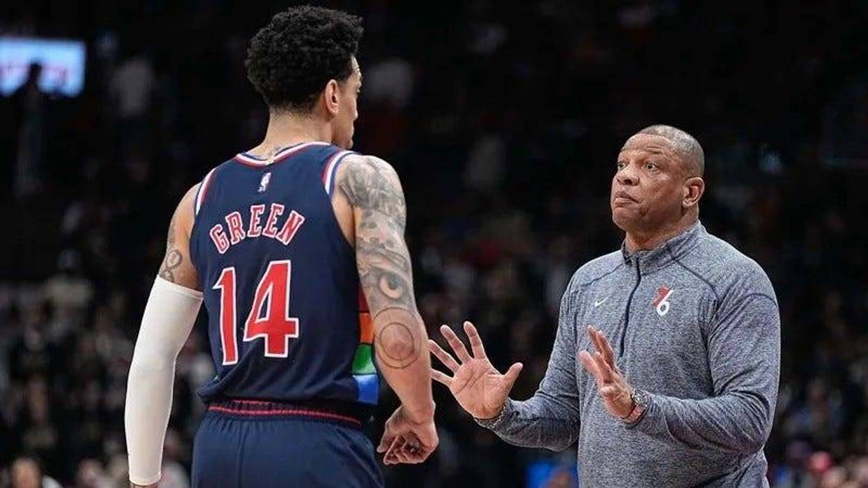 Philadelphia 76ers head coach Doc Rivers talks to forward Danny Green