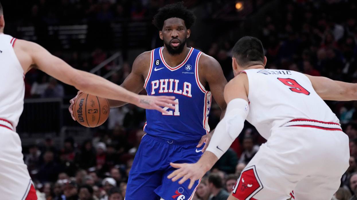 Philadelphia 76ers' Joel Embiid brings the ball up during the first half of an NBA basketball game against the Chicago BullsWednesday, March 22, 2023, in Chicago.