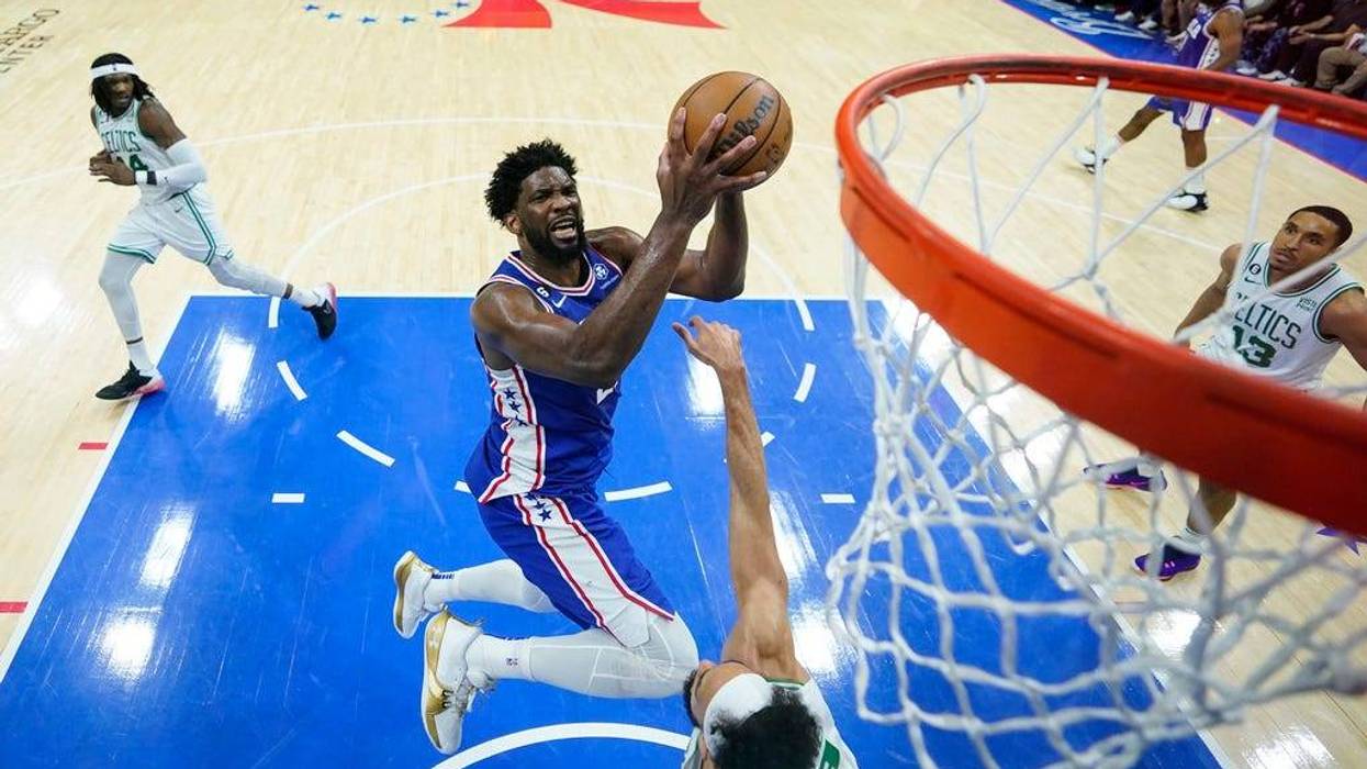 Philadelphia 76ers' Joel Embiid shoots against Boston Celtics' Derrick White during the second half of Game 6 of an NBA basketball playoffs Eastern Conference semifinal, Thursday, May 11, 2023, in Philadelphia.