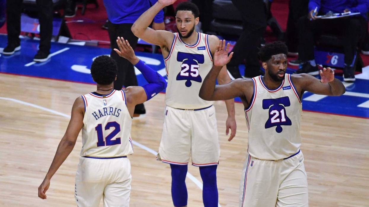 Philadelphia 76ers stars Joel Embiid, Ben Simmons, and Tobias Harris on the court.