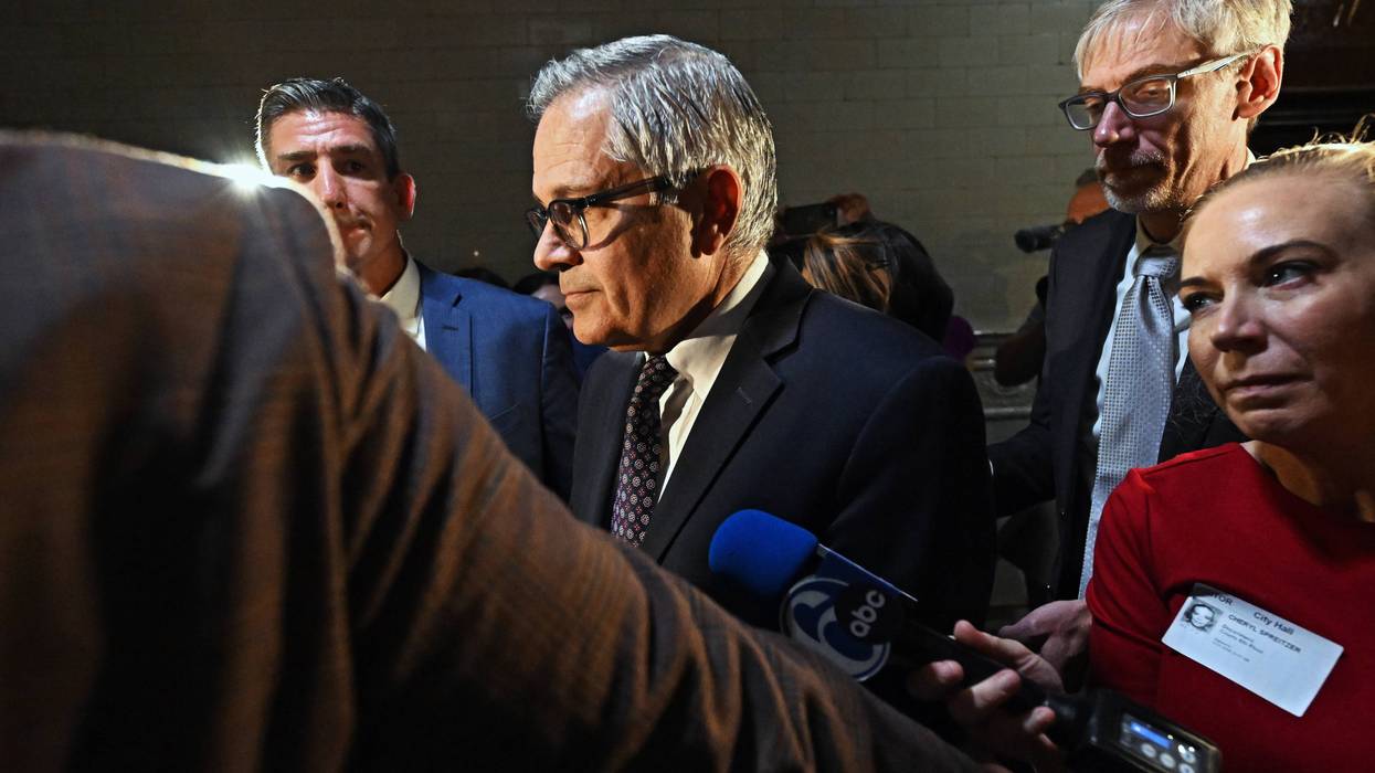 Philadelphia District Attorney Larry Krasner leaves a courtroom at Philadelphia City Hall on Oct. 31, 2024 after filing a lawsuit against Elon Musk.
